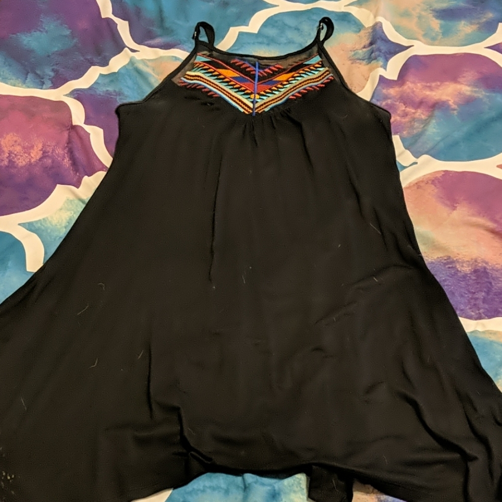 Black dress with aztec patterned neck line